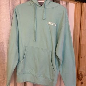 James Charles Sisters Repeating Teal Hoodie